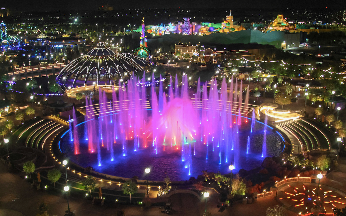 Epic Universe fountain at night